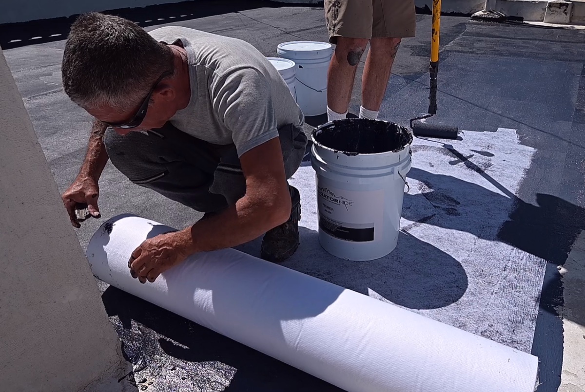 Instalación de tela de refuerzo para impermeabilización